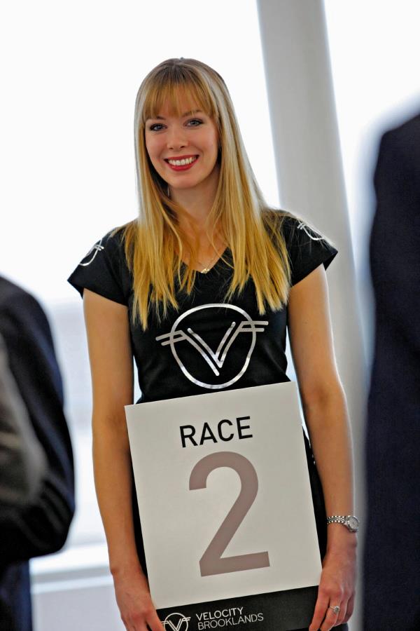 Velocity building Launch | Staff Holding Race Sign