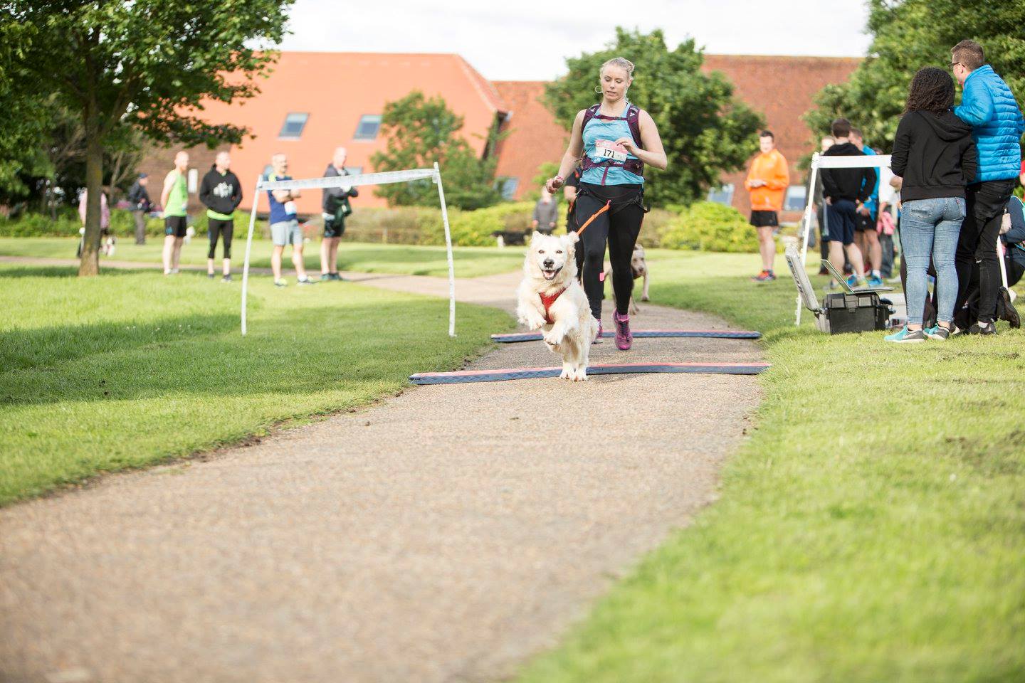 Caldecotte Lake 10K Run | Runner with her dog
